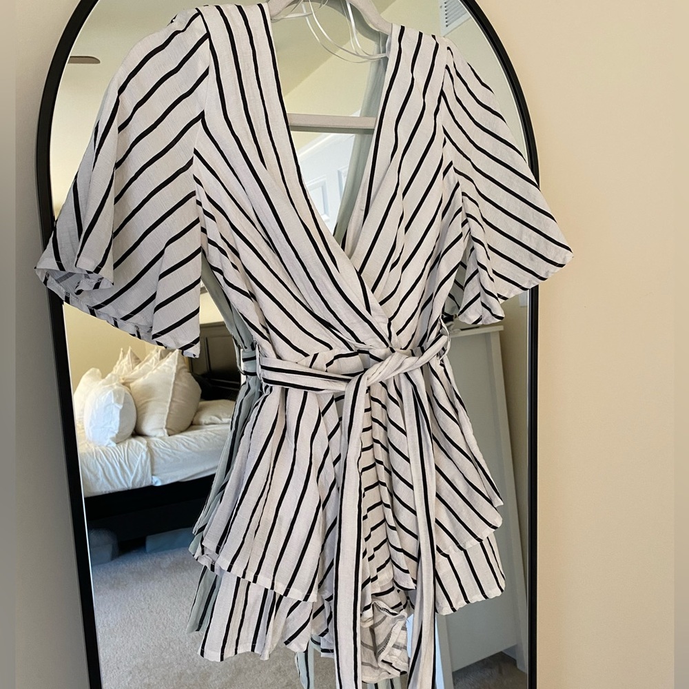 Worn once! Short romper - ties in back or front